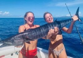 women with fish